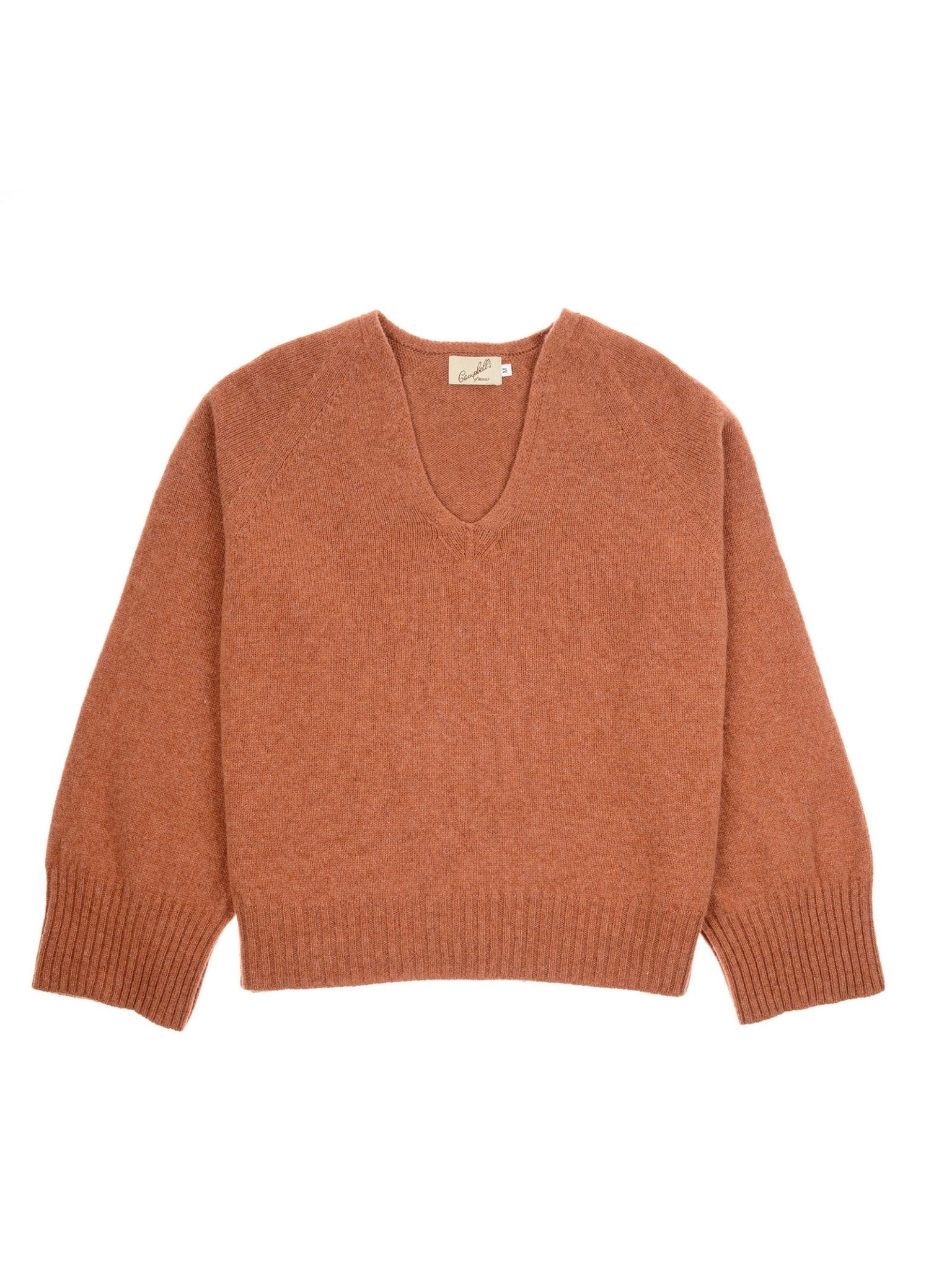 Campbell's of Beauly Geelong Lambswool V Jumper in rust, featuring long sleeves, ribbed cuffs and hem, and a V-neck. Crafted from soft Geelong lambswool and shown laid flat on a white background.