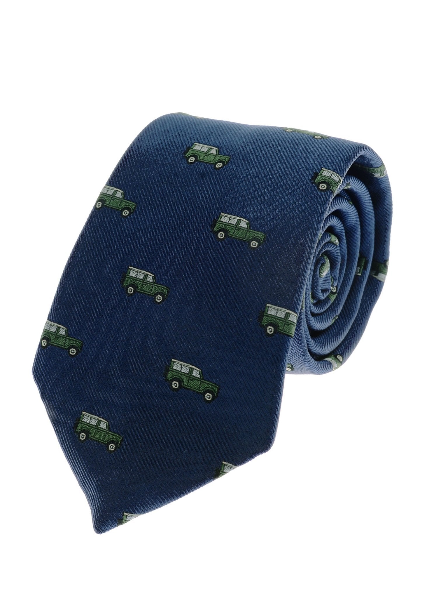 The Campbell's of Beauly Land Rover Defender Tie in navy, inspired by British motoring heritage, features a pattern of green cars and is displayed rolled up on a white background.