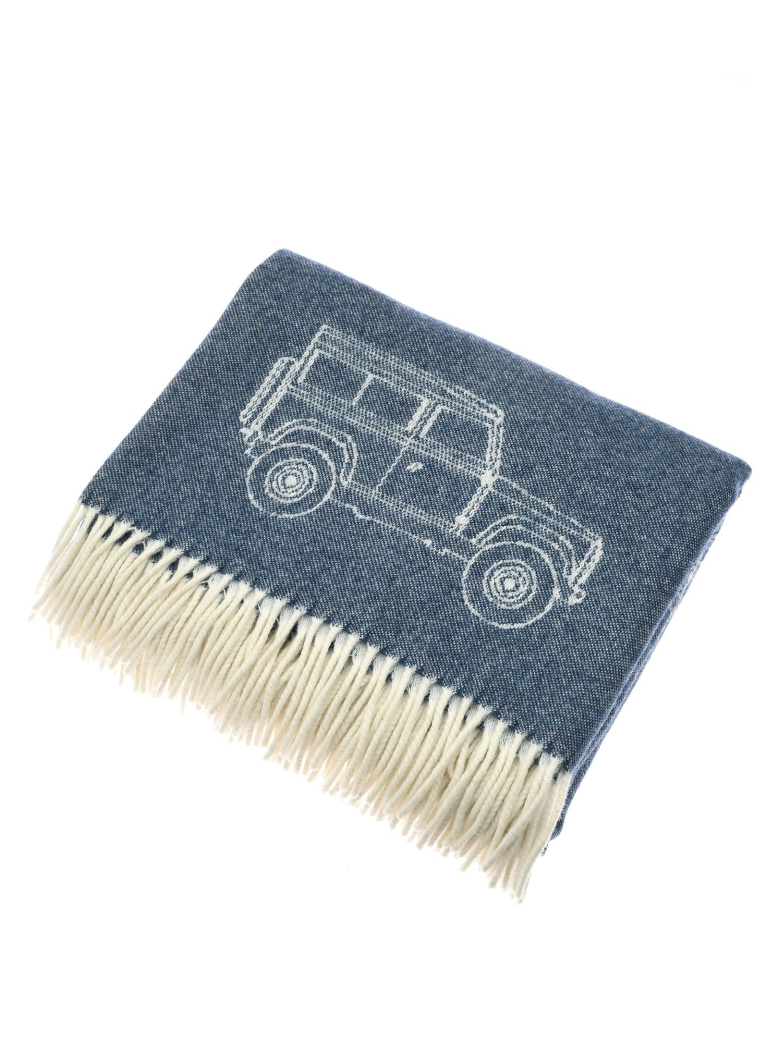 The Campbell's of Beauly Land Rover Defender Jacquard Throw is a reversible blue wool blanket with white fringe and an outlined Defender SUV design.
