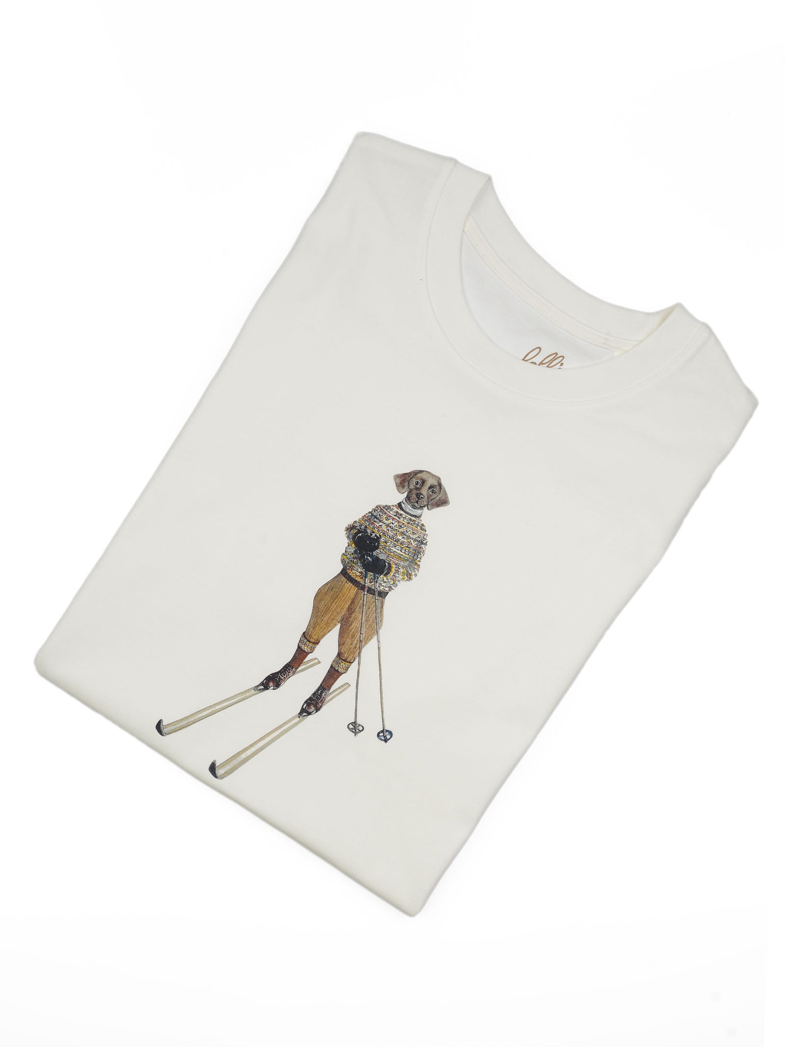 The Le Ski Labrador T-Shirt by Campbell's of Beauly features a white folded tee with a labrador illustrated in vintage skiing attire—perfect for your next skiing holiday.