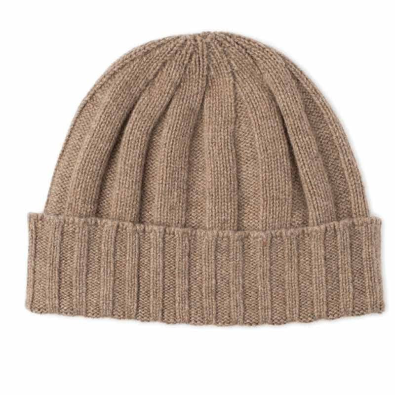 The Auld Stock Cashmere & Merino Rib Beanie by Campbell's of Beauly features a beige ribbed cuff, blending Scottish knitwear tradition with cashmere and merino wool, shown against a white background.
