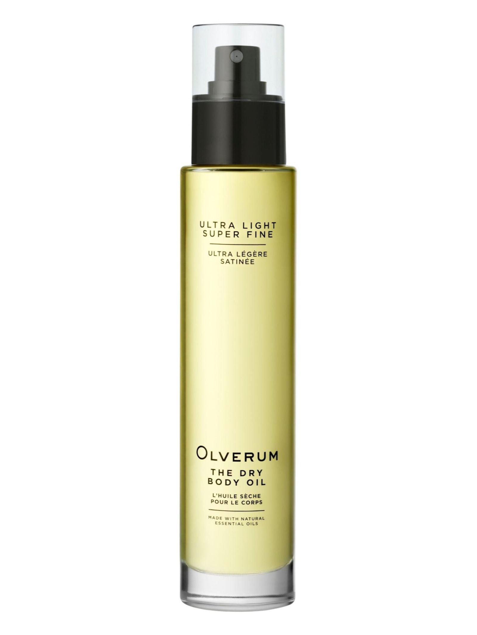 A tall, clear bottle with a black pump dispenses OLVERUM Dry Body Oil. The label reads "Ultra Light Super Fine" and "Made with natural botanical oils." The light yellow oil is perfect for nourishing hair and skin.